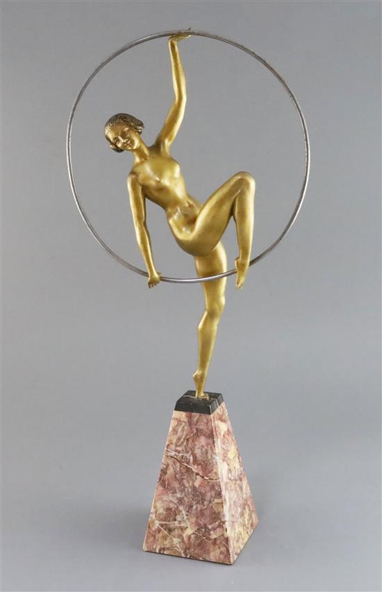 Attributed to G. Limousin. An Art Deco gilt metal figure of a hoop dancer, height 21in.